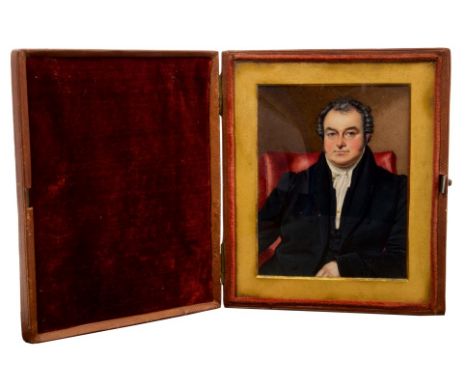 English School, circa 1830, watercolour on ivory portrait miniature of a gentleman, half-length, seated in a red chair, 11cm 