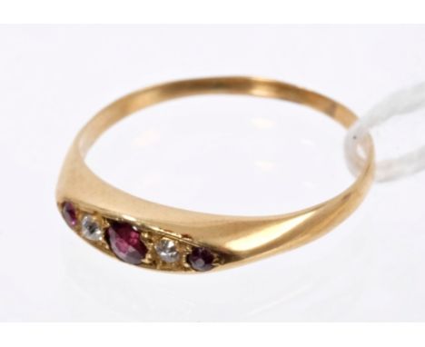 Late Victorian ruby and diamond five-stone ring with three round mixed cut rubies and two old cut diamonds in gold setting.  