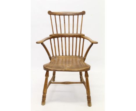 19th century ash and elm stick back Windsor chair with solid saddle seat on turned legs united by an H-stretcher, together wi