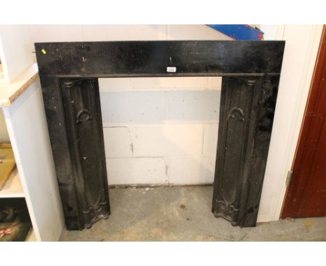 Victorian Gothic cast iron fire surround with tracery ornaments, total dimensions 107cm x 104cm, together with a partial ston