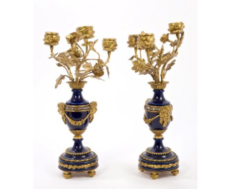 Pair late 19th century blue Sèvres-style porcelain and ormolu mounted candelabra with paste set band, human mask handles and 