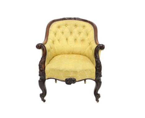 Good mid-19th century carved rosewood tub armchair mustard button upholstered and foliate carved show-wood frame, on castors