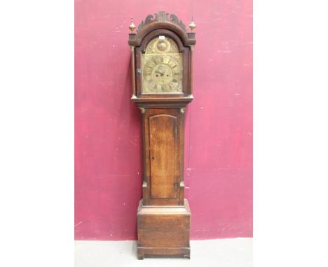 18th century eight day longcase clock with brass arched dial with sunburst in arch, subsidiary seconds and date aperture, sig