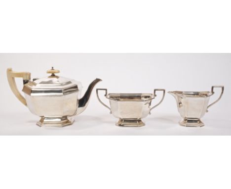 1930s silver three piece Art Deco-style tea set - comprising teapot of octagonal form, with angular ivory handle, hinged octa