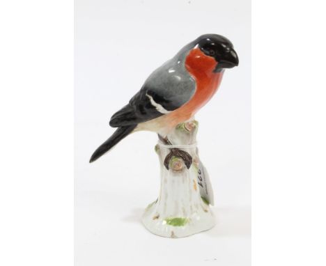 Late 19th century Meissen porcelain chaffinch with red, grey, black and white plumage, sitting on a trunk - blue crossed swor