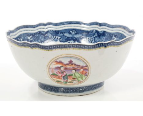 Late 18th century Chinese export punch bowl with painted Mandarin palette figure reserves and moulded and painted Fitzhugh-st