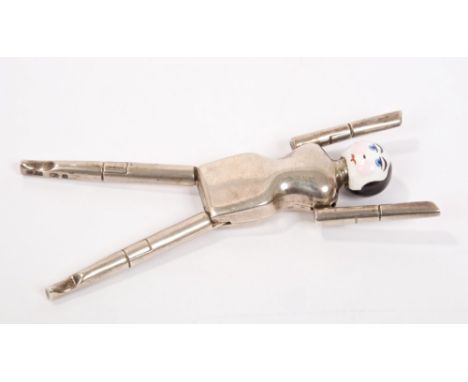 Rare 1920s pair silver and enamel novelty sugar tongs modelled in the form of a Dutch doll, with enamelled head and silver bo