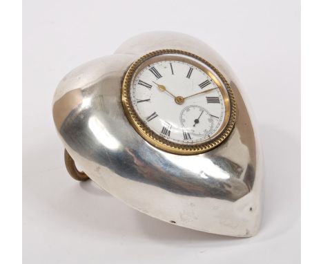 Late Victorian silver mounted desk clock with white inset pocket watch with enamel dial and gilt metal surround, in a heart-s