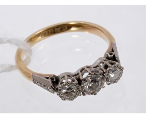 Diamond three-stone ring with three brilliant cut diamonds in illusion platinum setting, on 18ct gold shank.  Estimated total