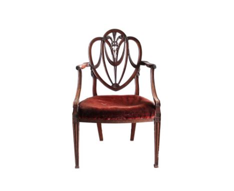 George III mahogany open elbow chair in the manner of Chippendale, with pierced and carved trefoil back and rosette boss, car