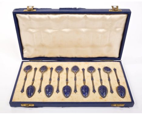 Late 19th / early 20th century set of twelve David Andersen Norwegian silver gilt and blue enamel coffee spoons with foliate 