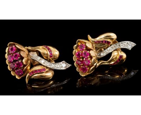Pair 1950s ruby and diamond earrings, each designed as a floral spray with a cluster of mixed cut rubies to the flower head, 