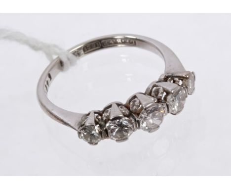 Diamond five-stone ring with five graduated old cut diamonds in platinum claw setting, on 18ct white gold shank.  Estimated t