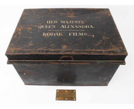 HM Queen Alexandra - brass name plate for a trunk, engraved 'Queen Alexandra', 6.5cm x 11cm and black painted tin trunk - the