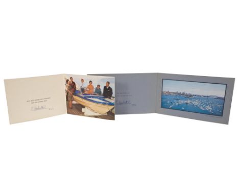 HM Queen Elizabeth II - two signed Christmas cards for 1969 and 1970 - both with twin gilt embossed Royal cipher to cover and