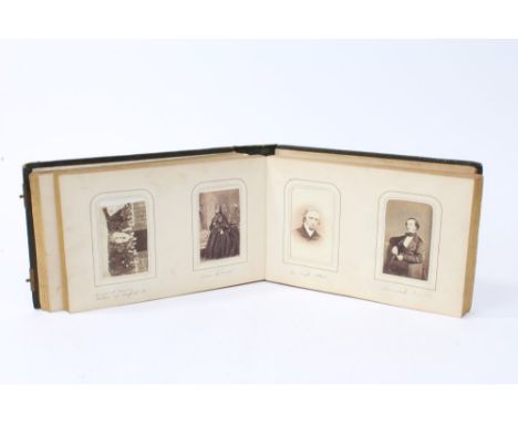 A Victorian photograph album containing carte de visite portrait photographs of celebrities and various members of the Britis