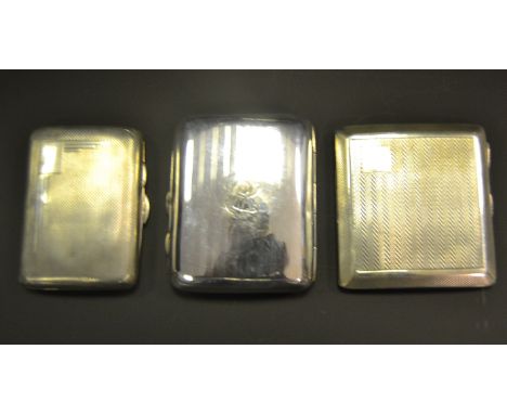 A George V bowed rectangular cigarette case, engine turned in bands, Chester 1918;  others, Birmingham 1860  Birmingham 1910 