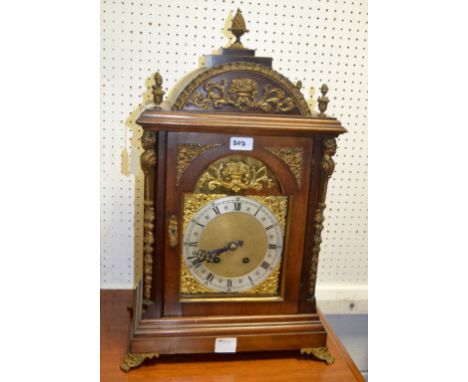 A 19th century mahogany  and gilt metal mounted bracket clock, the 18cm silvered dial with Roman numerals, twin winding holes