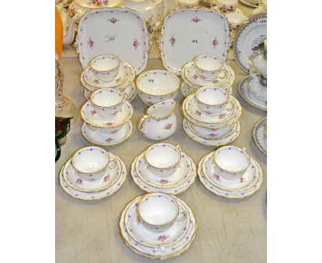 A Royal Crown Derby 7780 pattern hand painted tea service, for twelve, inc sugar bowl, cups, saucers, side plates, etc, pink 