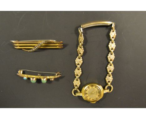 A 9ct gold and seed pearl bar brooch, a turquoise set brooch etc (3)