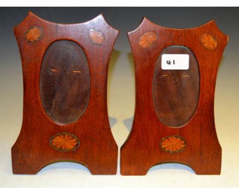 A pair of Edwardian mahogany and marquetry easel photograph frames, inlaid with oval batwing paterae, c.1905