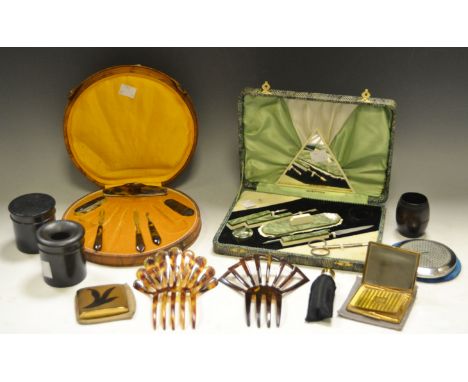 Ladies Ephemera - a faux tortoiseshell comb, another; a cased bakelite manicure set, another tortoiseshell c 1920's Stratton 