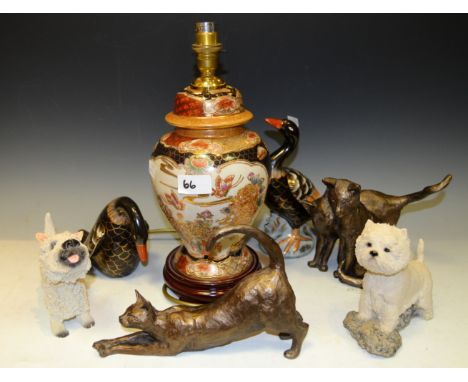 An Oriental baluster shaped table lamp; a pair of Oriental ceramic Geese; resin models of West Highland Terriers; bronzed mod