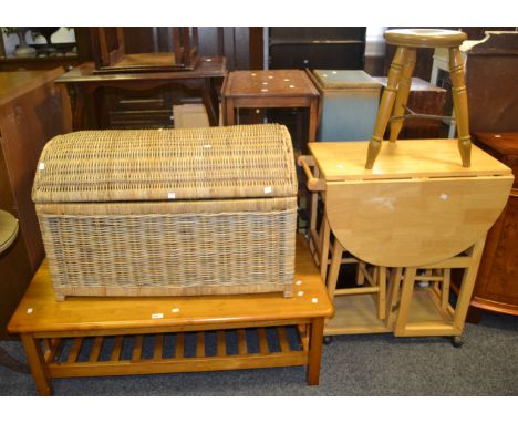 A contemporary pine coffee table; a domed wicker trunk; a drop leaf kitchen table and stools;  etc 