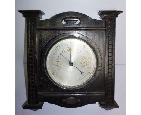 E. Lennie Mc Call Optician Edinburgh, Oak Cased Wall Hanging Barometer, circa early 20th century, 38cm high, 33cm wide