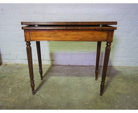 Mahogany Fold Over Card Table, Enclosing a Green Felt Lined Interior, Raised on Reeded Legs, 74cm high, 84cm long, 83cm wide