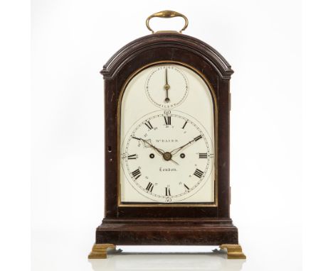 GEORGE III EBONISED BRACKET CLOCK
maker William Baird, London circa 1801, the arched top surmounted by a brass handle, the bo