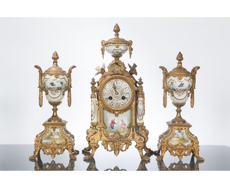 19TH CENTURY FRENCH ORMOLU CLOCK GARNITURE 
the clock with urn-shaped finial, the painted porcelain circular dial over a porc