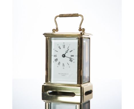 20TH CENTURY ENGLISH LAQUERED BRASS CARRIAGE CLOCK
Taylor & Bligh, London, the white dial with Roman numerals, the unsigned m