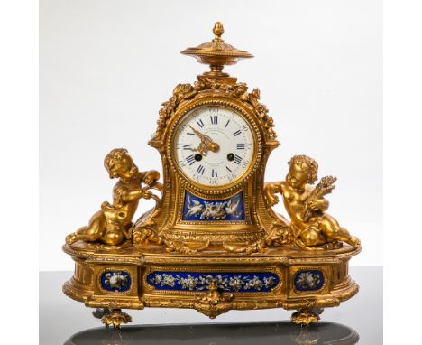 19TH CENTURY FINE ORMOLU MANTEL CLOCK
maker Le Roy et Fils, in the Louis XV style, the face flanked by two seated putti, the 