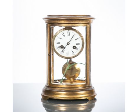 FRENCH FOUR GLASS OVAL BRASS MANTEL CLOCK
the 8cm white dial with Roman numerals and Arabic seconds, the two train movement s