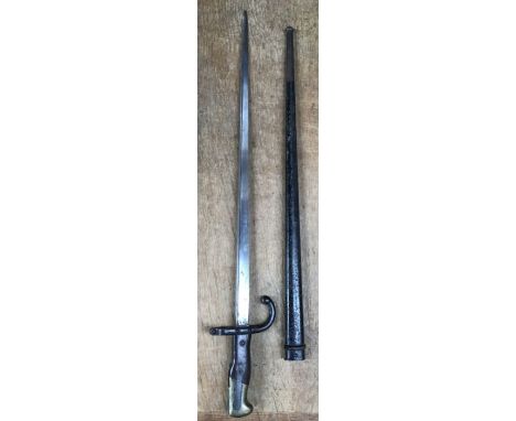 French Gras bayonet M1874 with scabbard, back of blade etched and dated 1877. Blade length 20 1/2” overall length 26”.