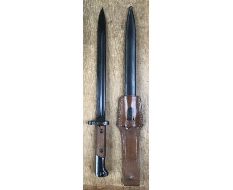 Czechoslovakian post WW2 bayonet with scabbard and frog.blade length 12” overall length 17”.