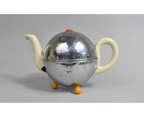 A 1930's WMF Bauscher Teapot with Cream Glazed Ceramic Body Encircled by Chromed Cover, with Bakelite Button Finial and Feet,