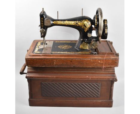 A Vintage Cased Manual Singer Sewing Machine 