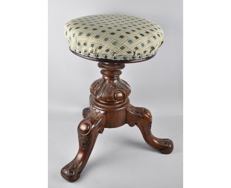 A Victorian Swivel Topped Piano Stool with Carved Mahogany Tripod Base 