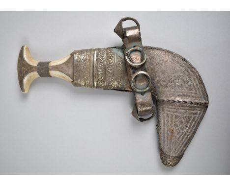 An Arabic Jambiya Curved Blade Dagger with Decorated White Metal Scabbard 
