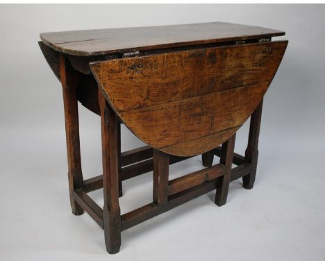 A 19th century Oak Drop Leaf Gate Leg Table with Oak Top, 93cms Long 