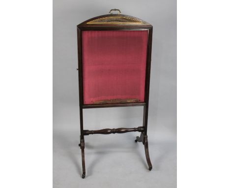 A Mahogany Framed Regency Dining Room Cheval Screen with Two Pull Out Panels and Central Fixed Panel Raised on Four Splayed R