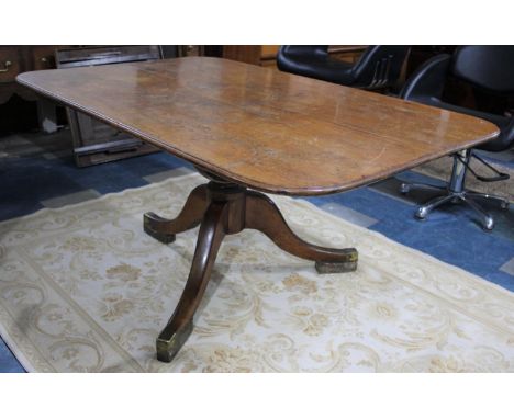 A 19th Century Snap Top Breakfast Table Supported on Heavy Turned Pillar and Splayed Tripod Base, 150cm wide 