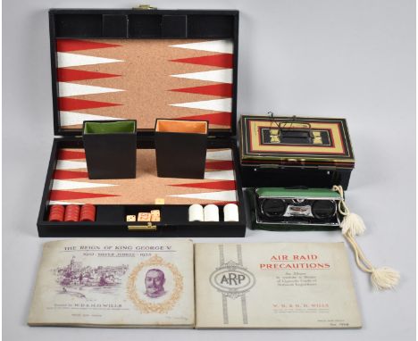 A Pair of Vintage Folding Binoculars, Cash Tin, Two Cigarette Pad Albums and a Travelling Backgammon Set 