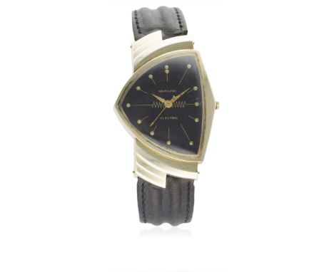 A GENTLEMAN'S 14K SOLID GOLD HAMILTON ELECTRIC WRIST WATCH CIRCA 1960
D: Gloss black dial with gilt markers &amp; hands. M: M