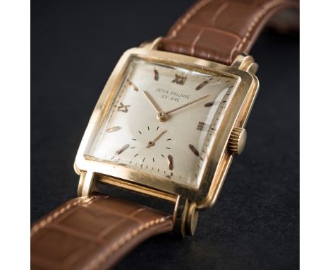 A RARE GENTLEMAN'S 18K SOLID GOLD PATEK PHILIPPE WRIST WATCH CIRCA 1948 D: Silver dial with faceted gold batons &amp; quarter