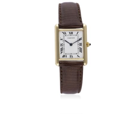 A GENTLEMAN'S 18K SOLID GOLD CARTIER TANK WRIST WATCH CIRCA 1990
D: White dial with black Roman numerals &amp; inner minute t