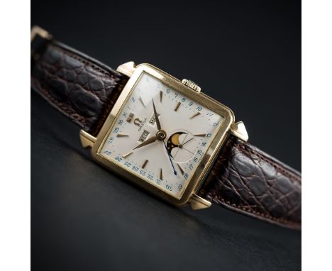 A RARE GENTLEMAN'S 18K SOLID GOLD OMEGA COSMIC MOONPHASE&nbsp;TRIPLE CALENDAR WRIST WATCH CIRCA 1951
D: Silver dial with gilt