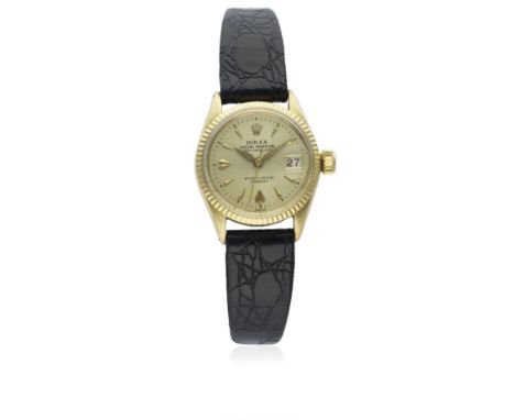 A RARE LADIES 18K SOLID GOLD ROLEX OYSTER PERPETUAL LADY DATEJUST WRIST WATCH CIRCA 1958, REF. 6517
D: Champagne dial with gi